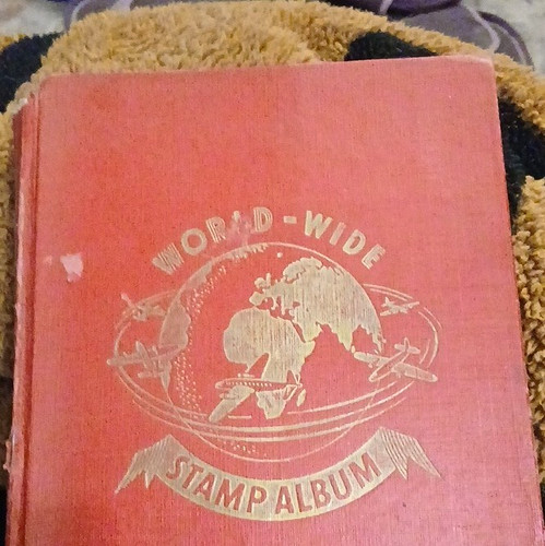 World wide stamp album ring - world-wide,
